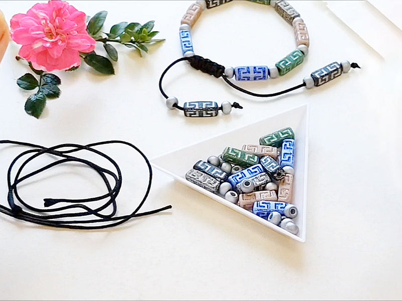 DIY Sliding Clasp Bracelet Kit using multi-colored Celtic Block Beads and Pony Pressed Beads with silver accents.