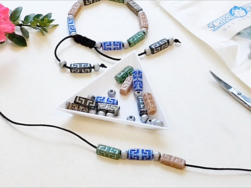 DIY Sliding Clasp Bracelet Kit using multi-colored Celtic Block Beads and Pony Pressed Beads with silver accents.