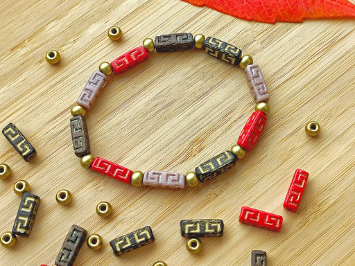 Creative Set: DIY Bracelet made of multi-color Celtic Block and Pony Beads with gold accents.
