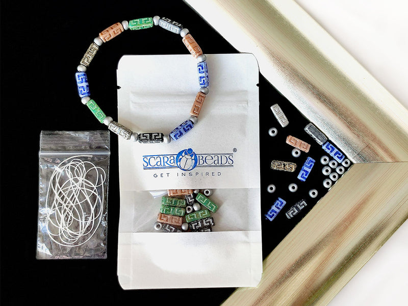 Creative Set: DIY Bracelet made of multi-color Celtic Block and Pony Beads with silver accents.