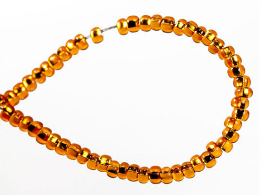 20 g 10/0 Seed Beads Preciosa Ornela, Dark Amber Silver Lined, Square Hole, Czech Glass