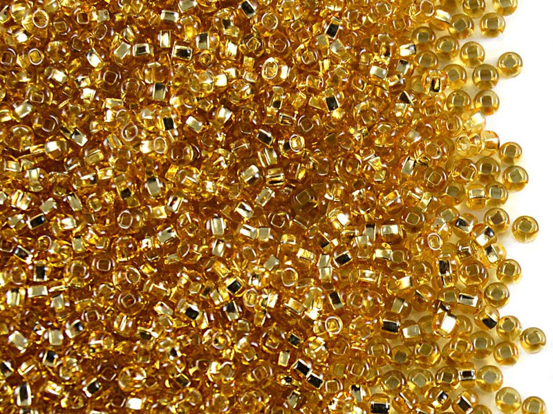 20 g 10/0 Seed Beads Preciosa Ornela, Amber Silver Lined, Square Hole, Czech Glass