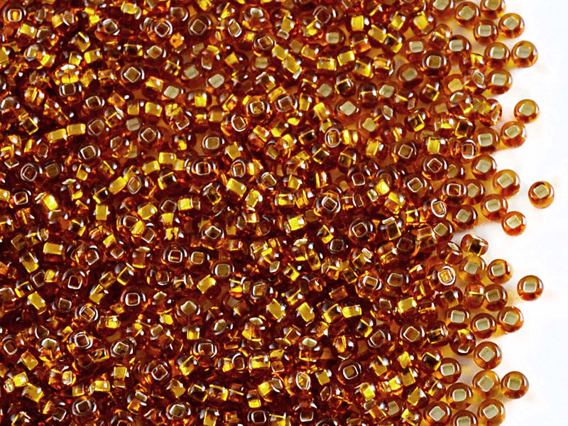 20 g 10/0 Seed Beads Preciosa Ornela, Dark Amber Silver Lined, Square Hole, Czech Glass