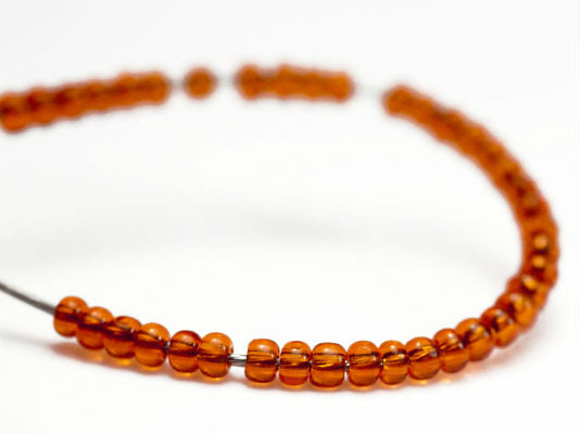 10 g 13/0 1-Cut Seed Beads Charlotte Preciosa Ornela, Orange Transparent, Czech Glass