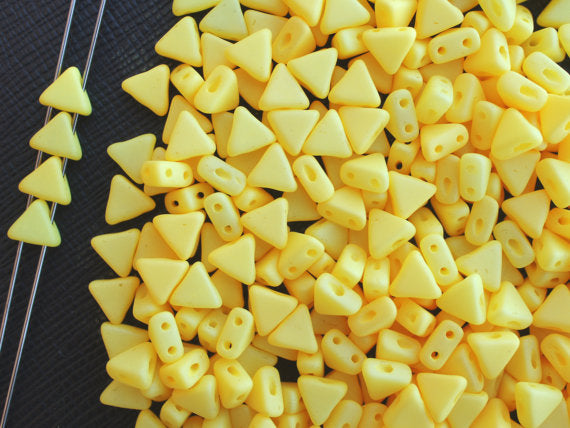 50 pcs Khéops® Par Puca® 2-hole Beads, Triangle 6mm, Opaque Jonquil Silk Matte, Czech Glass